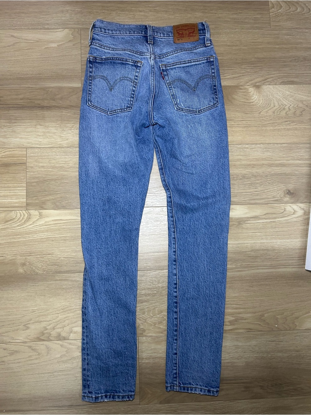 Levi's Women's Straight Leg Jeans in Light Blue Distressed Denim - Picture 7 of 8